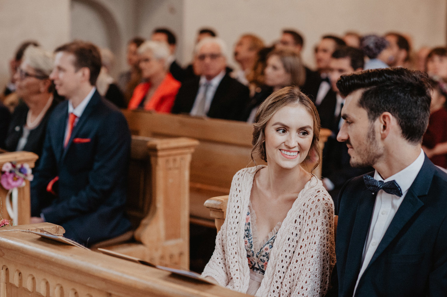wedding couple looking lovingly at each during ceremony