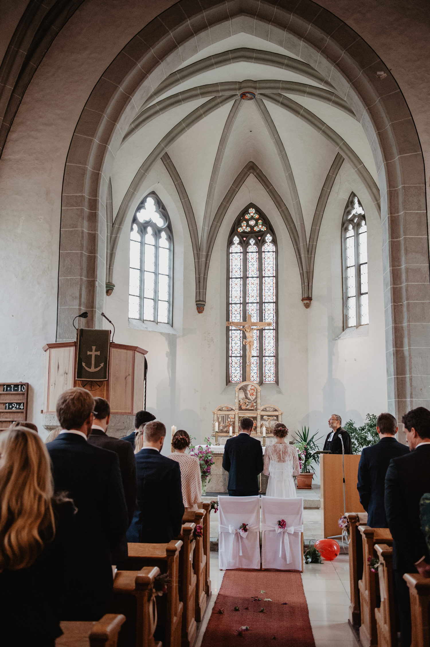 bohemian wedding couple in midcentury modern scandi style church 