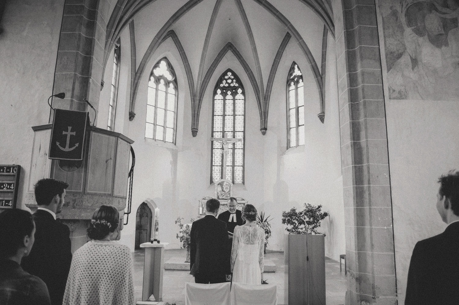 bohemian wedding couple in midcentury modern scandi style church 