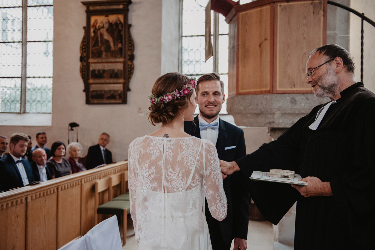 bohemian wedding couple in midcentury modern scandi style church 