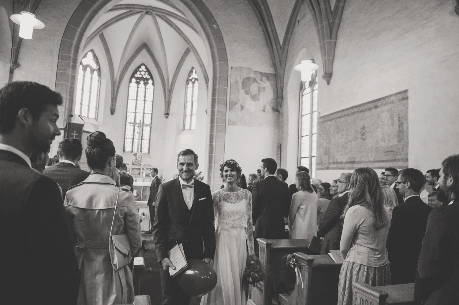 bohemian wedding couple in midcentury modern scandi style church 