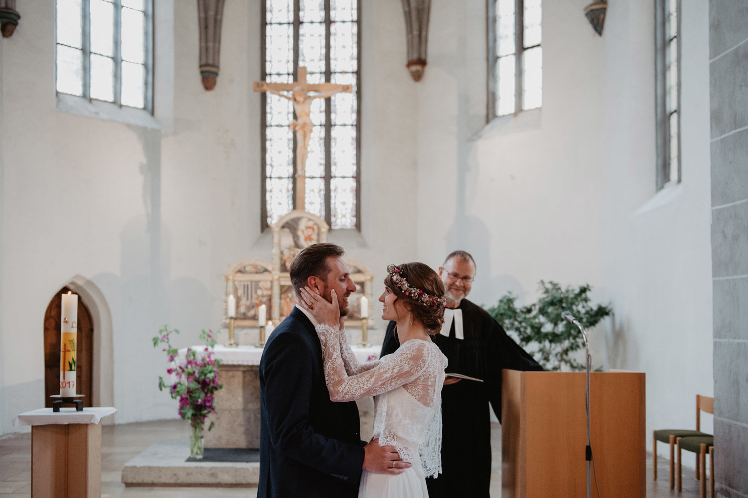 bohemian wedding couple in midcentury modern scandi style church