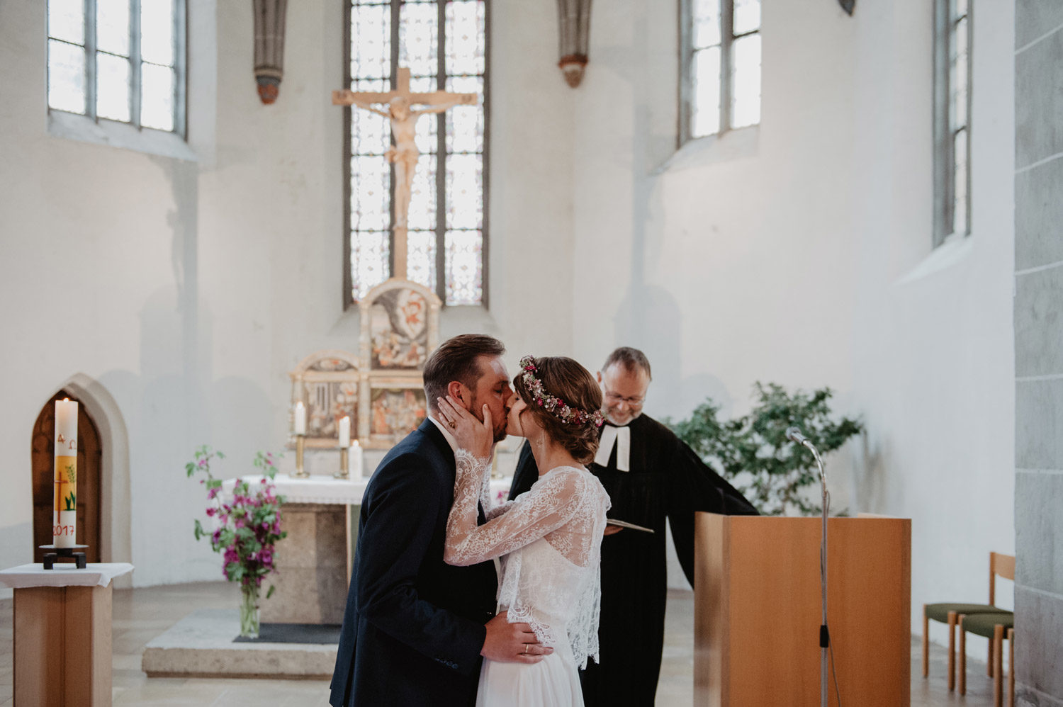 bohemian wedding couple in midcentury modern scandi style church