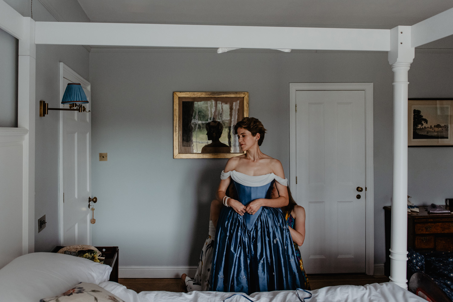 stately home bride getting ready blue wedding dress vogue paula nadal anne schwarz photography